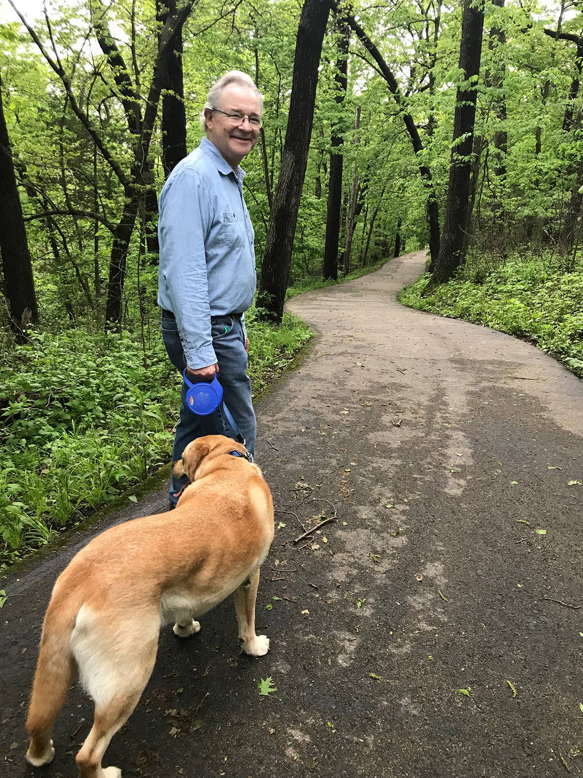 Stan and Watson hike in the beautiful hills outside Galena, Illinois