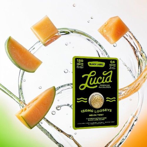 Product packaging with melon pieces and water splashes.
