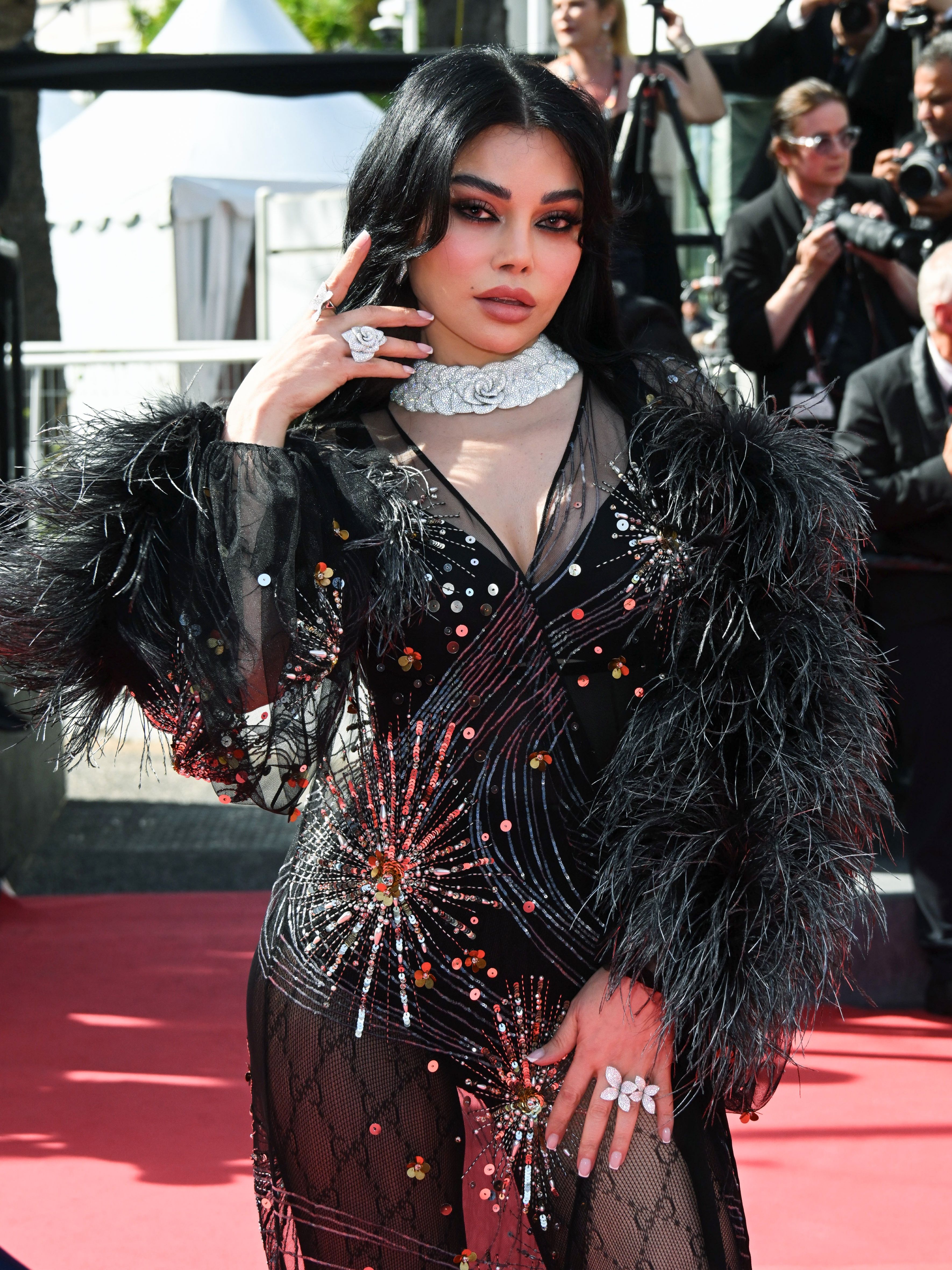 A stylish Eifha in a glamorous poses on a red carpet with the Rosina collection.