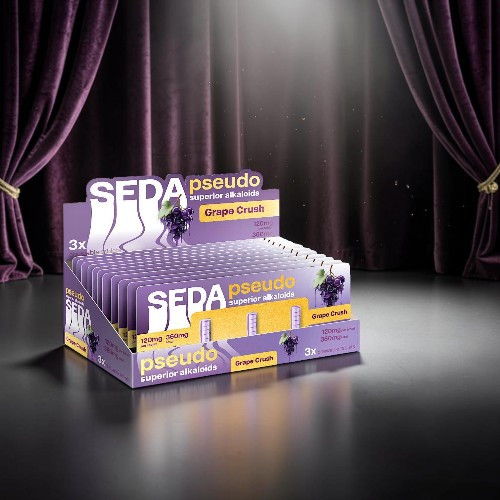 Display of Seda pseudo product packaging under dramatic lighting.