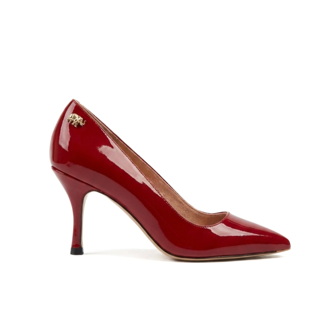 A red patent leather high heel shoe with a pointed toe.