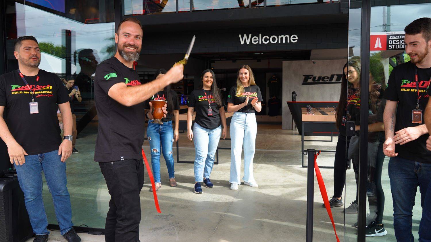 FuelTech Founder and CEO, Anderson Dick, cuts the ribbon at the opening of our new headquarters.