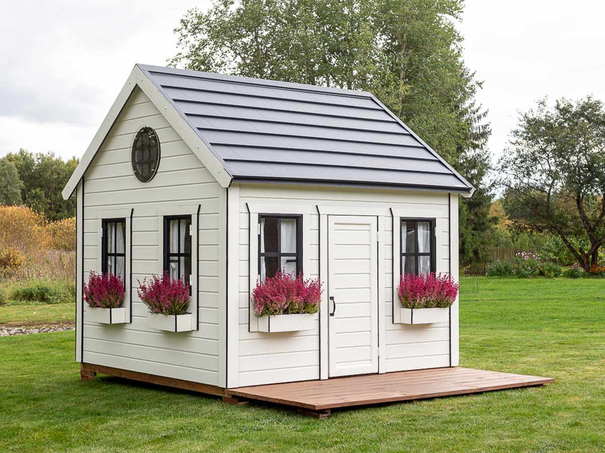 Wooden Playhouse with White Walls, Black Roof and Flower boxes by WholeWoodPlayhouses