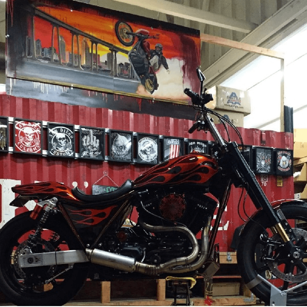 Motorcycle Shop with display of motorcycle tee shirts framed in Shart Original T-Shirt Frames