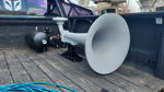 Large Kahlenberg air horn with air tank and compressor mounted in Ram pickup truck bed