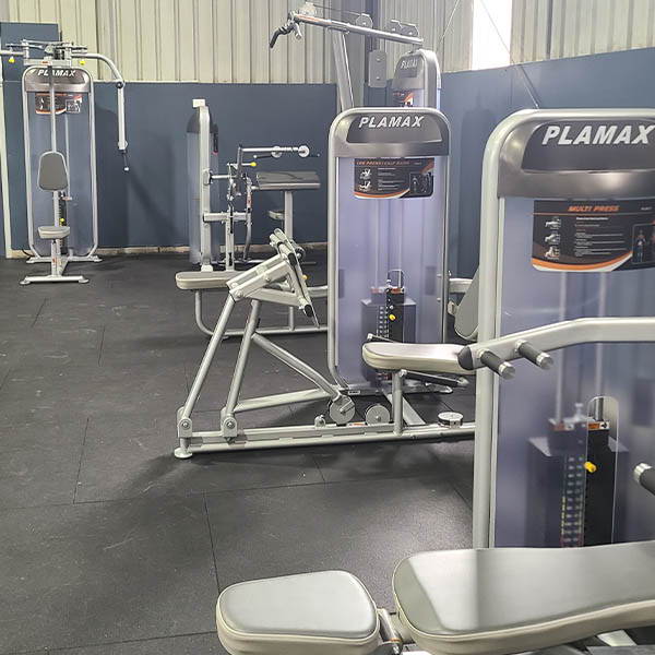 High School Gym Fit Out showcasing a range of strength machines for targeted muscle training in a safe and supervised environment.
