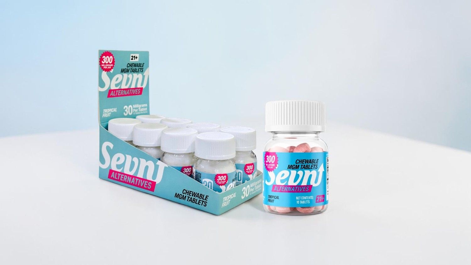 Bottles of serum supplements displayed with packaging on a light background.