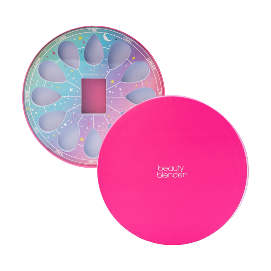 Colorful beauty blender sponge packaging with a pink circular case.