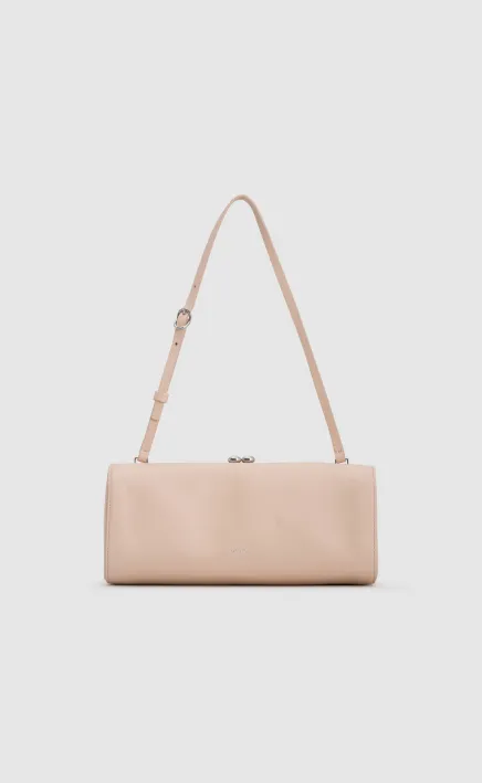A simple, light pink handbag with a shoulder strap.