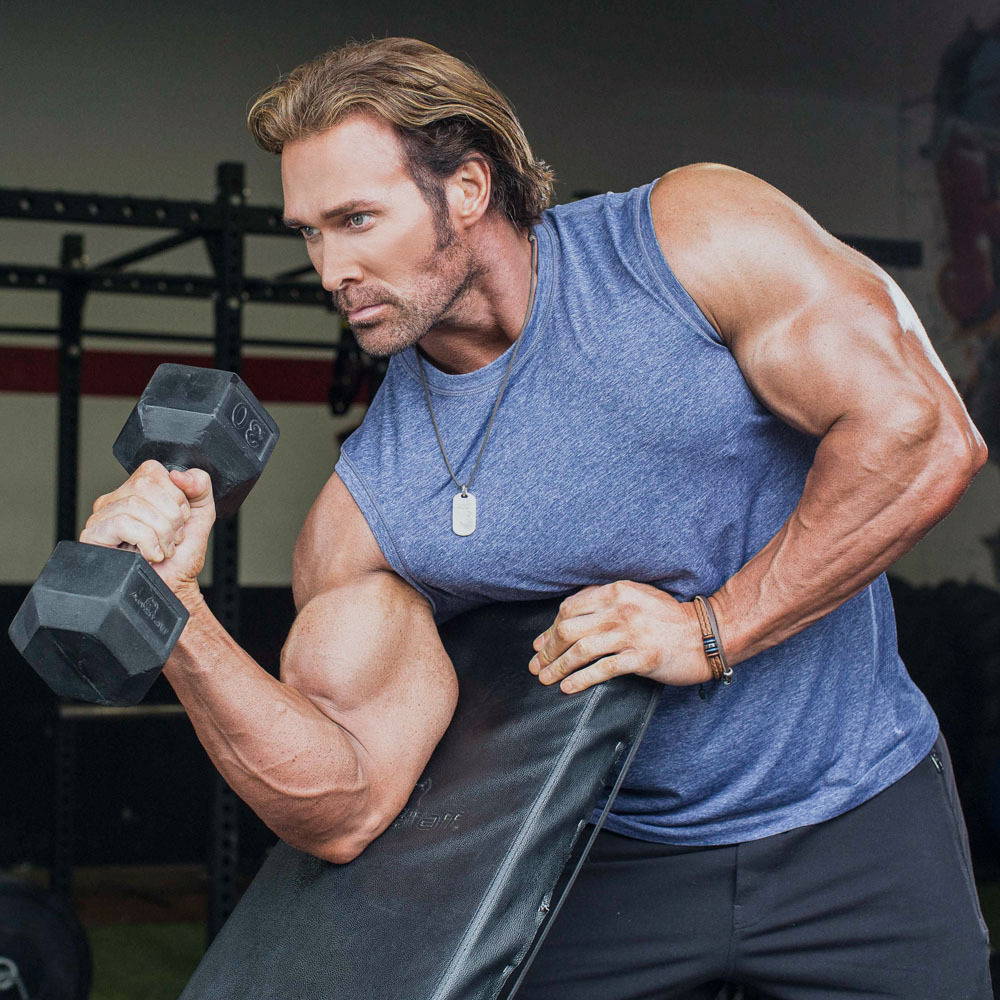 Photo of Mike O'Hearn doing a bicep curl