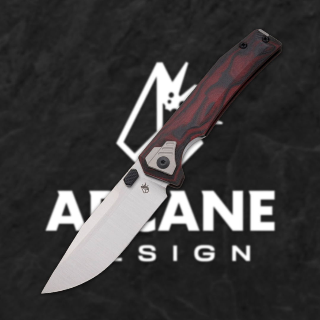 A folding knife with a metallic blade and red handle on a dark background.