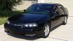 Front-three-quarter view Mike's 2004 Chevrolet Impala full-size sedan HornBlasters Conductor's Special 544 Nightmare Edition train horn kit featured customer install gallery photo 1