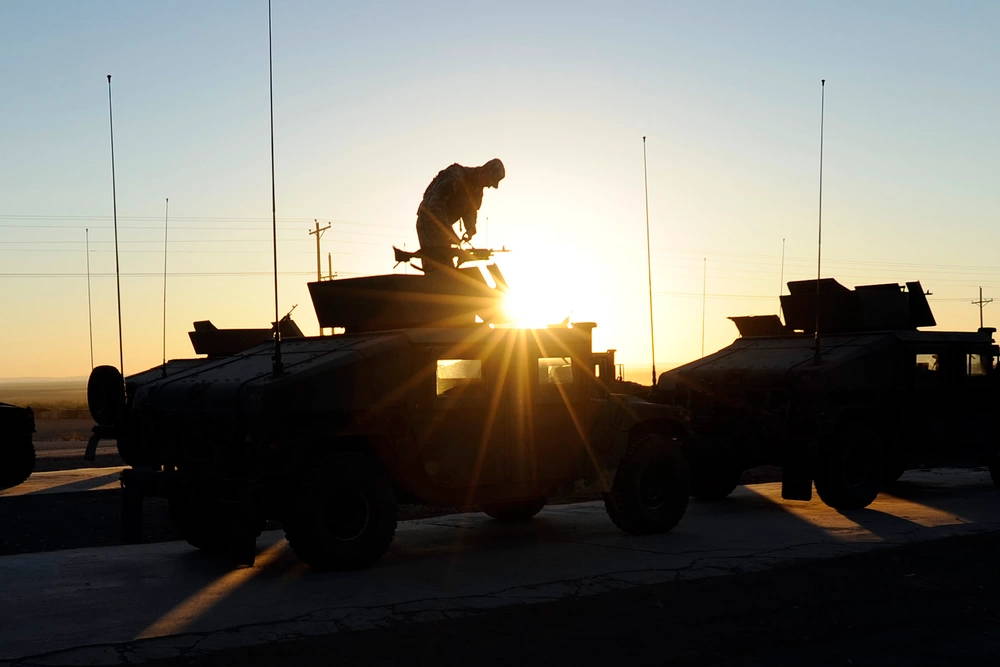 Texas National Guardsmen from Task Force Raptor (3-124 CAV) up early getting their gun trucks ready for the ranges. The soldiers are qualifying on the gun truck gunnery range in preparation for their deployment to the Horn of Africa early next year.