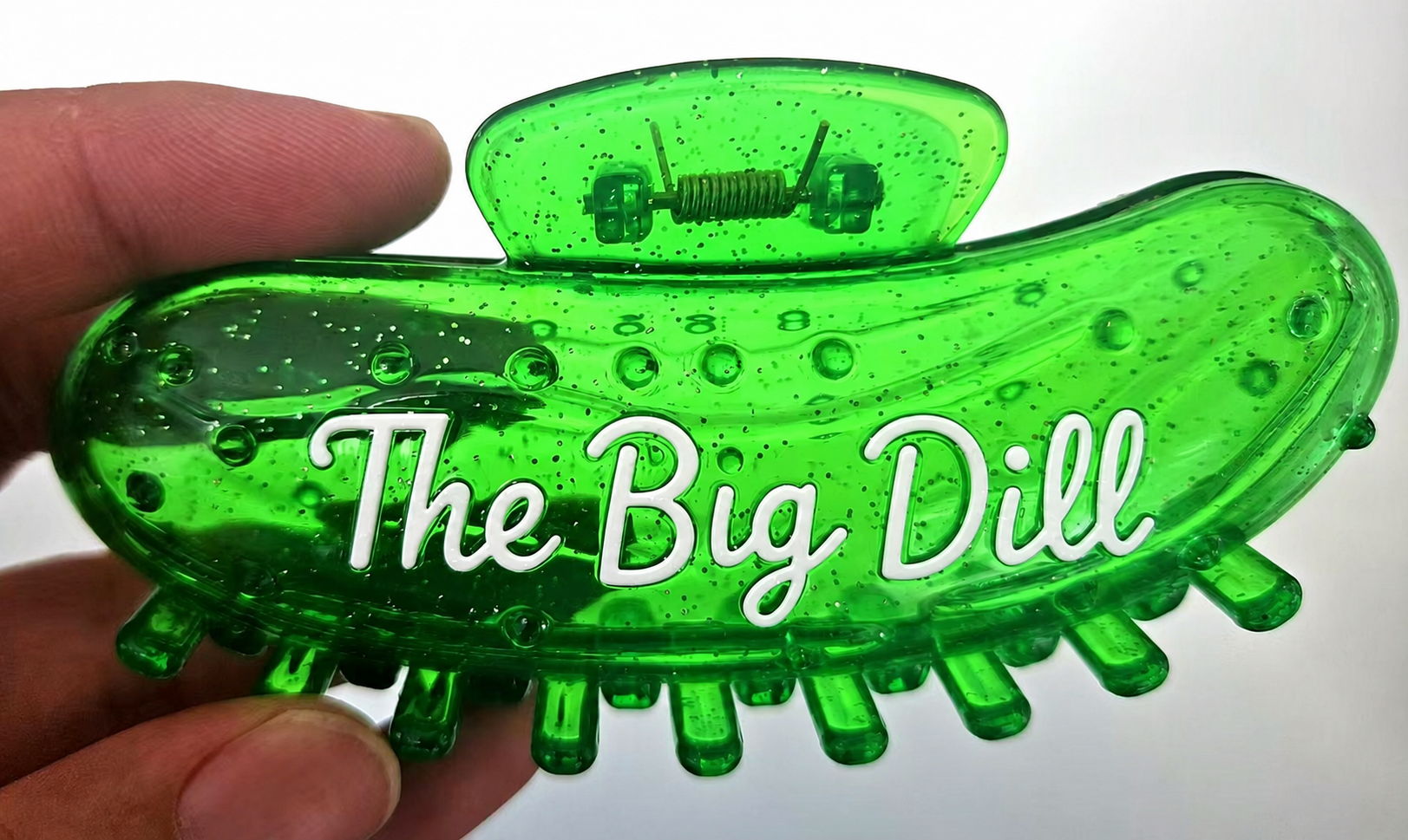 The Big Dill custom glitter pickle hair clip included in the VIP swag bag