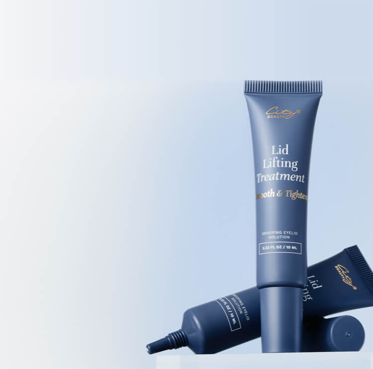 Blue skincare tube on a light background.