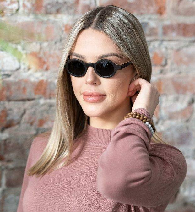 Woman wearing Magnolia. Small Round Vintage Sunglasses