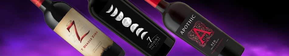 Three wine bottles with stylish labels against a purple background.