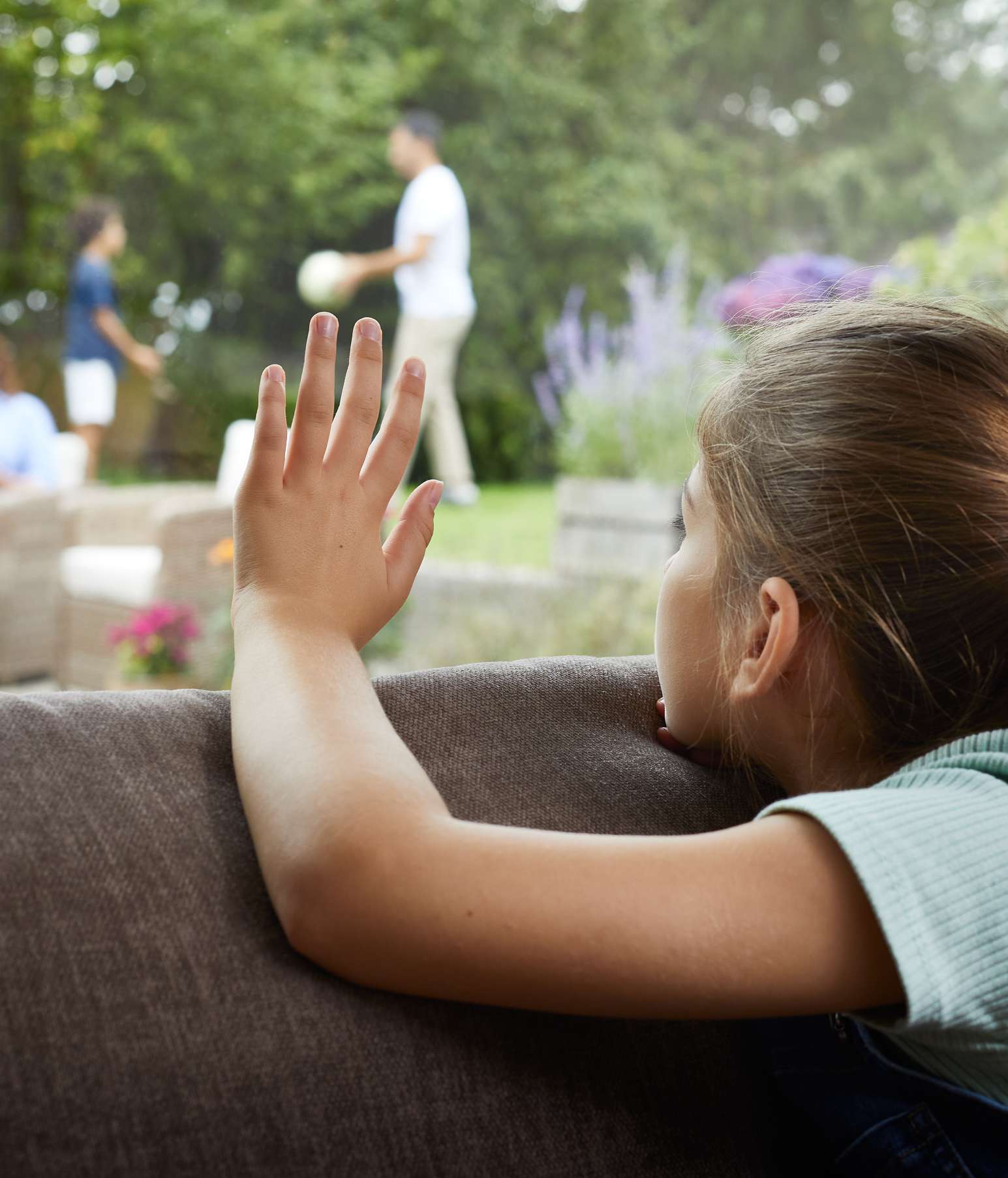 Mother putting allergy drops in her daughter’s eyes before they leave for school – maybe she’s allergic to pollen or dust mites