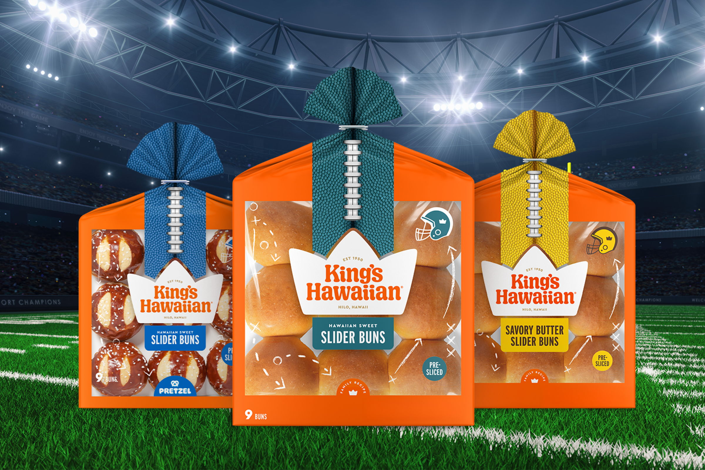 Package of King's Hawaiian Original Hawaiian Sweet Slider Buns, Hawaiian Sweet Pretzel buns, and Savory Butter Slider Buns on a football field background.