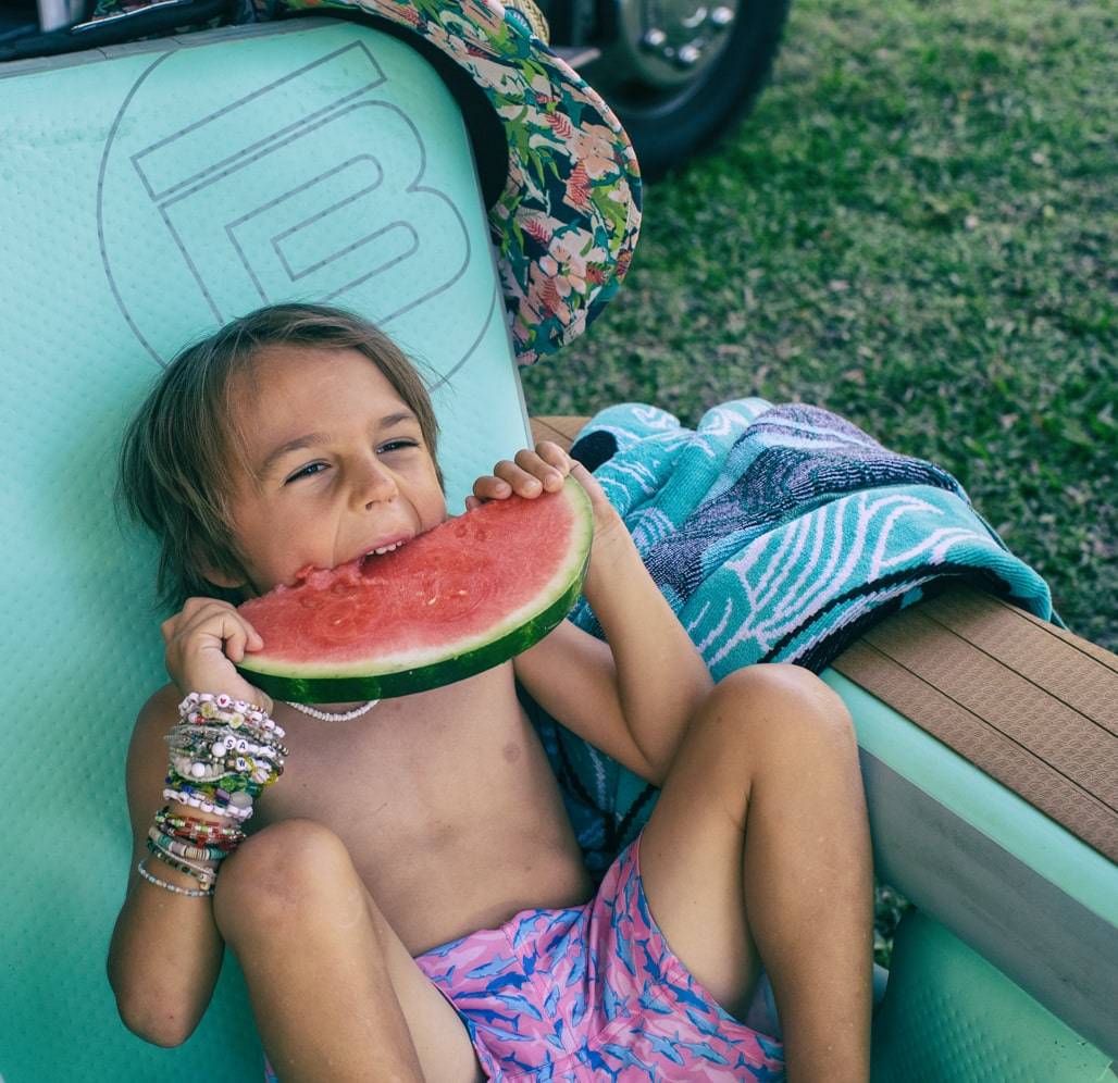 Eating watermelon in an AeroRondak® Chair