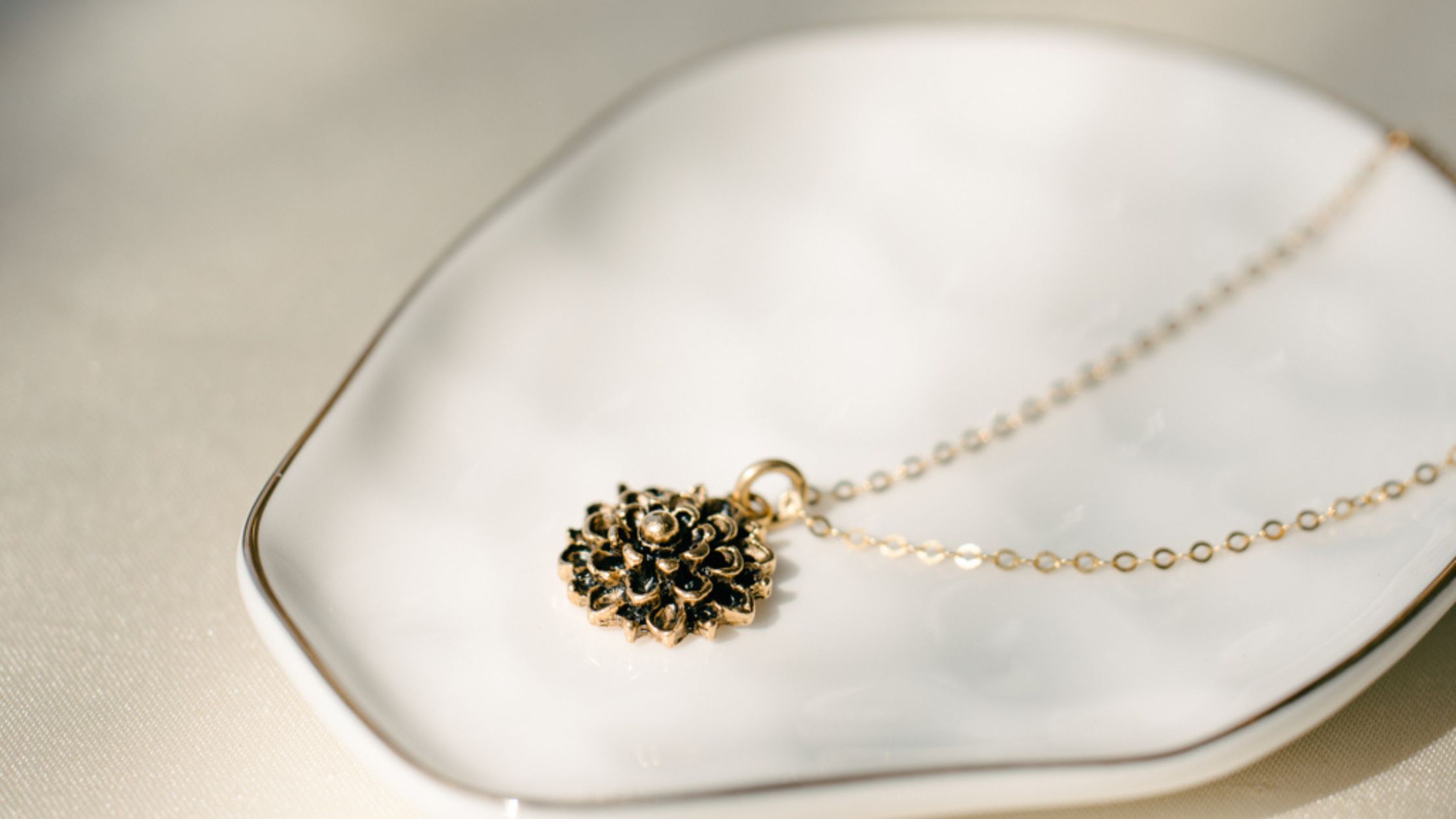 The Mandy Locket in sterling silver and gold