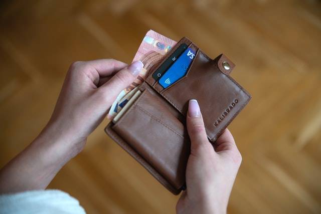 Woman Holding Her Wallet 