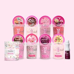 Assorted pink sprinkles and toppings in various containers on a pink background.