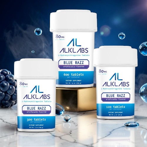 Three containers of Blue Razz tablets from Alklabs with blue background.