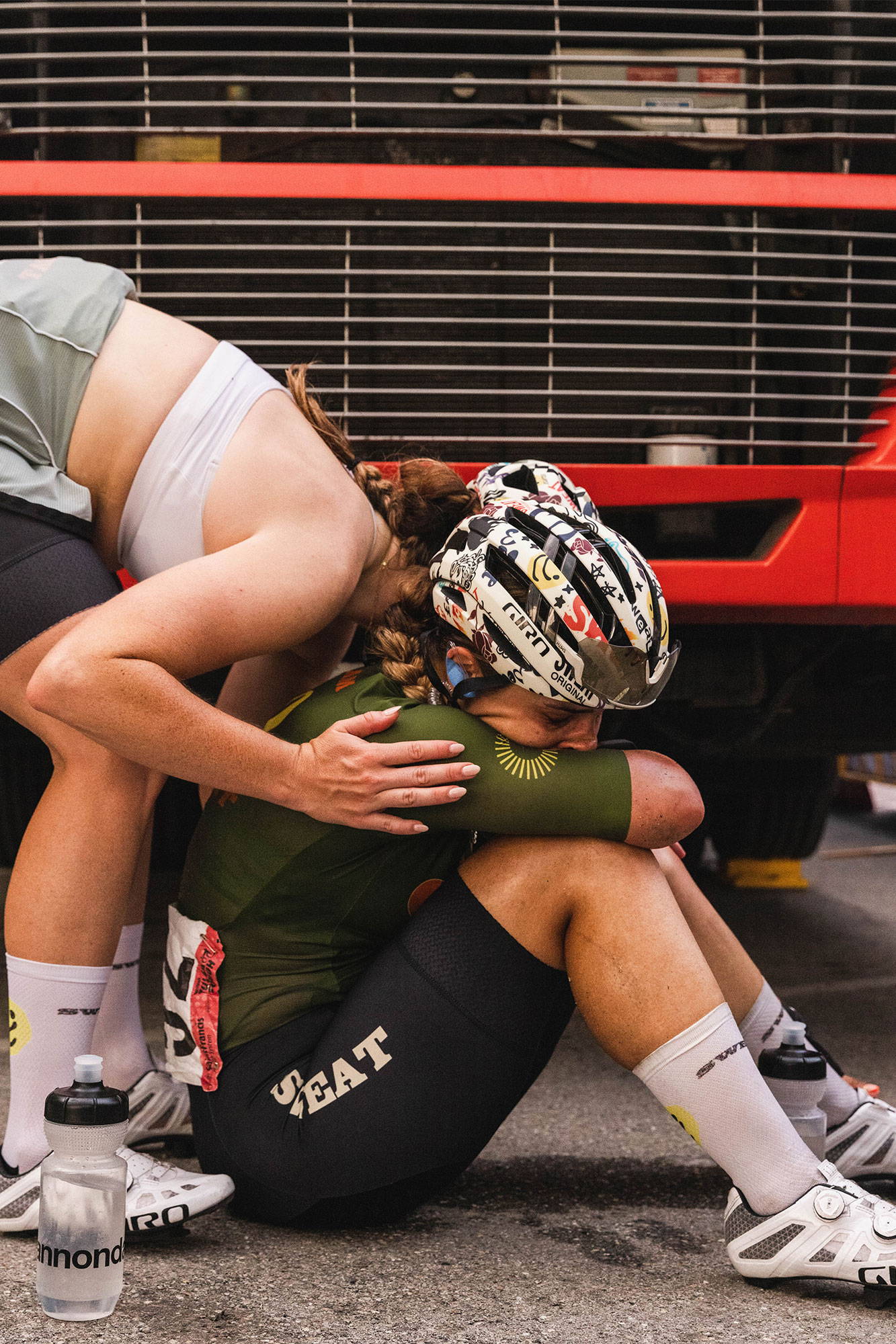 Teammate being consoled after a race