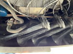 Three black Conductor's Special train horns mounted under engine bay oil filter hoses Taylor's Ford Transit 228H gallery photo 3