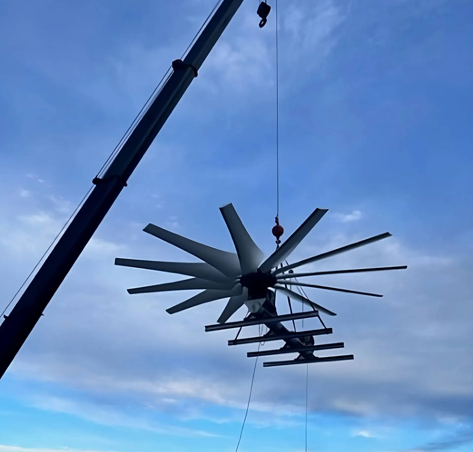 Cooling Tower Fan Being Installed Via Crane