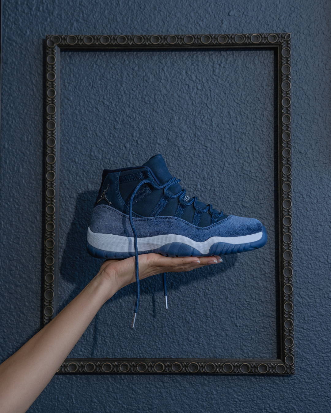 aj11 retro midnight navy in a picture frame