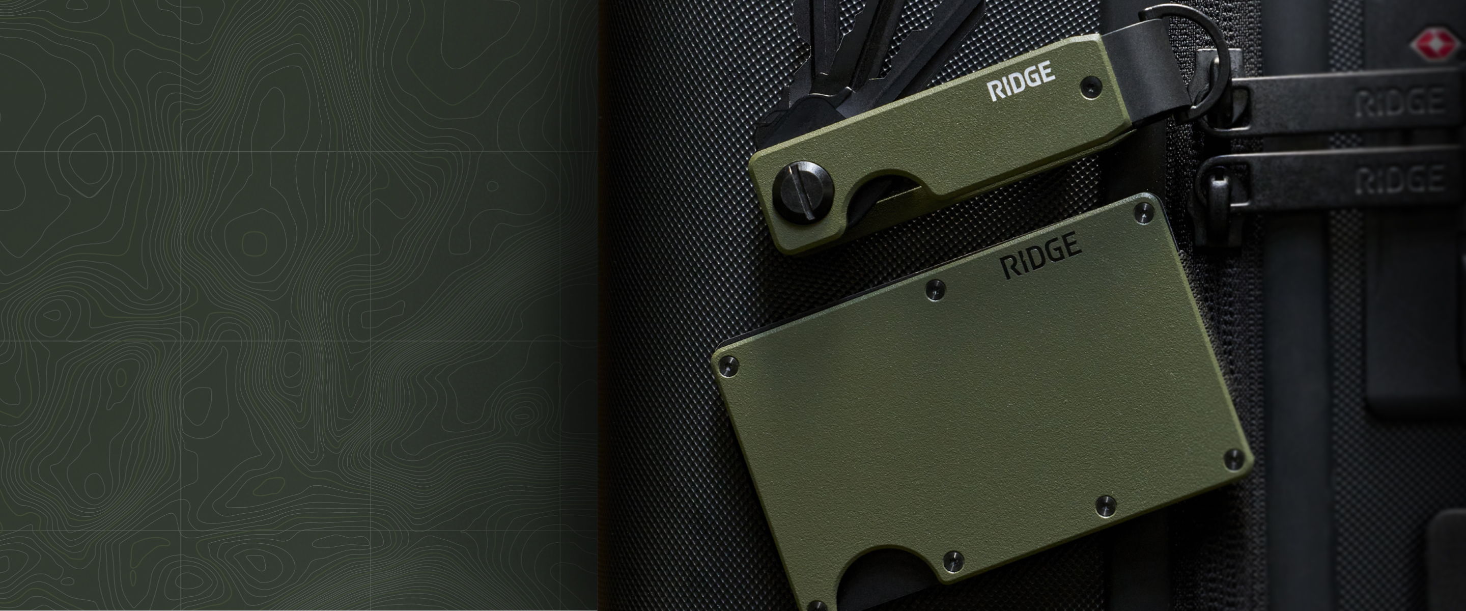Green military-style gear resting against a dark background.