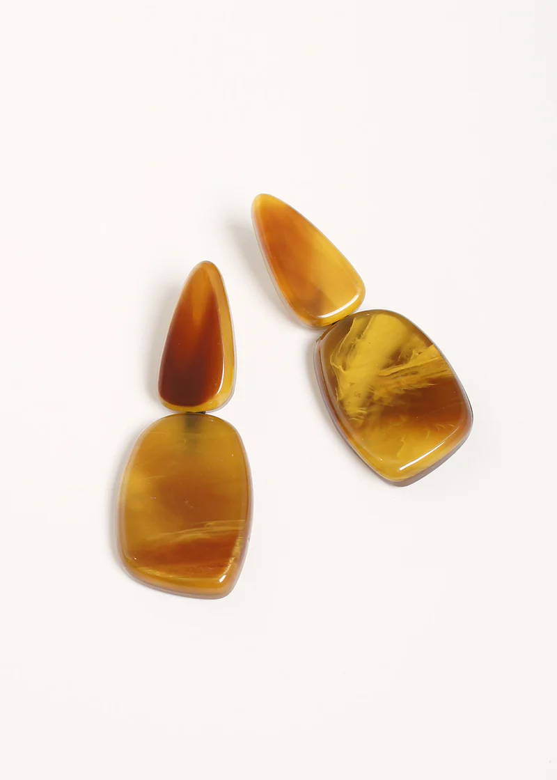 A pair of vintage inspired earrings with large amber oval pendants