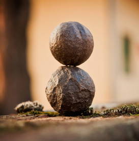 two-round-stones-balancing-equanimous