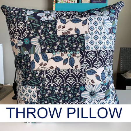 pillowcase for a throw pillow with a patchwork top with blue fabrics and a french seam finishing
