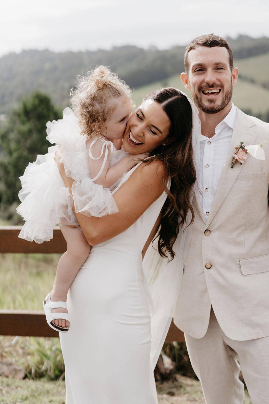 Bride and Groom with their daughter