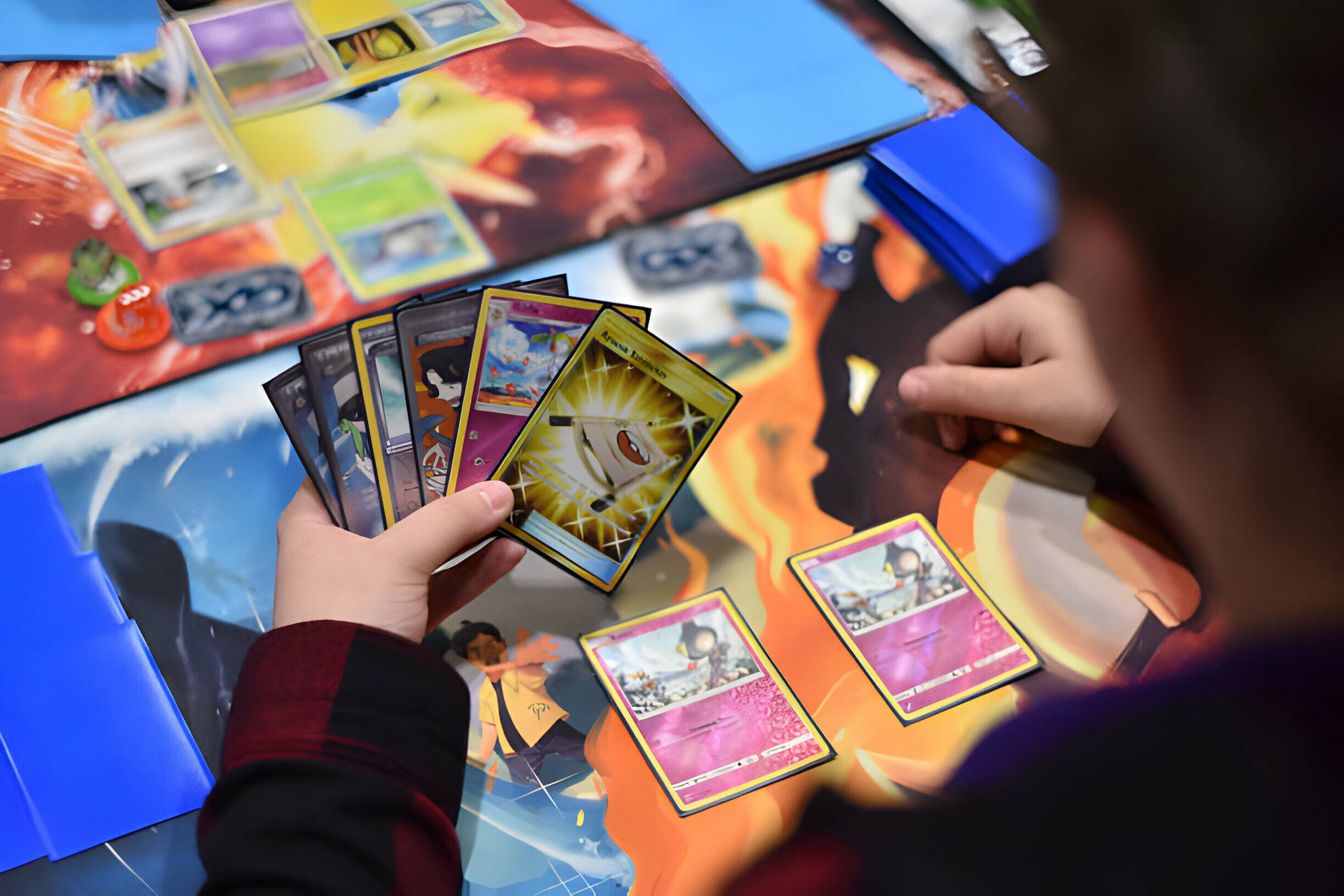 Person playing Pokemon TCG tabletop game