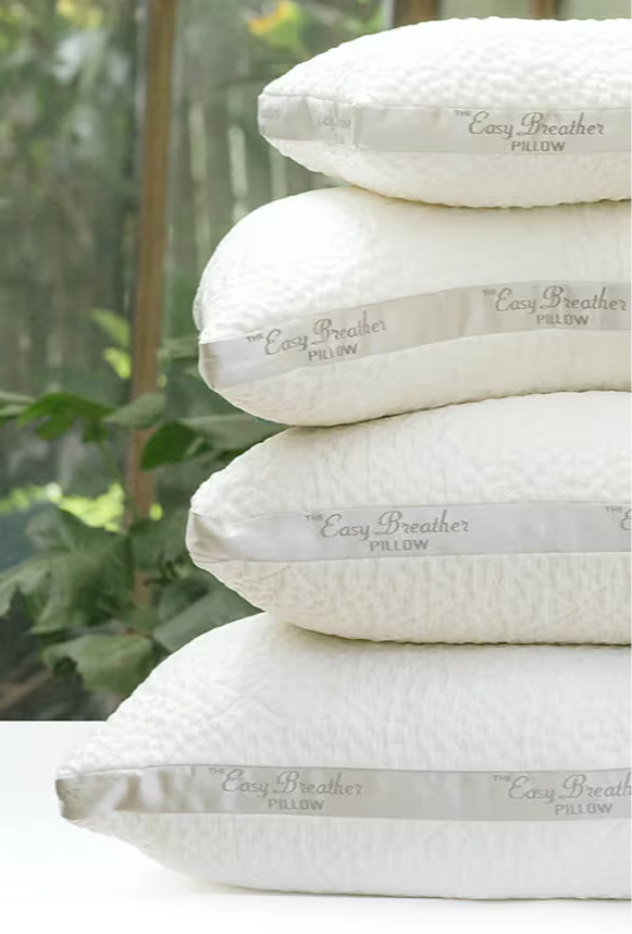 a stack of four different easy breather pillow sizes