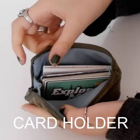A DIY card holder wallet with a zipper holding a bunch of cards