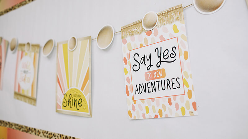 Motivational posters and bead cut outs create an inspirational display.