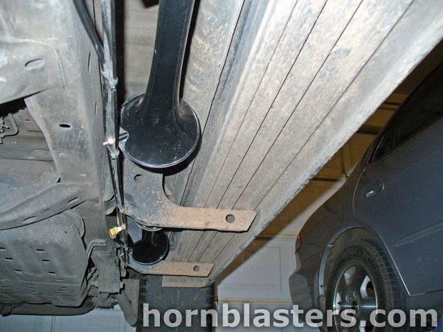 Two black Shocker XL train horns mounted frame rails undercarriage Toyota 4Runner HornBlasters gallery photo 4