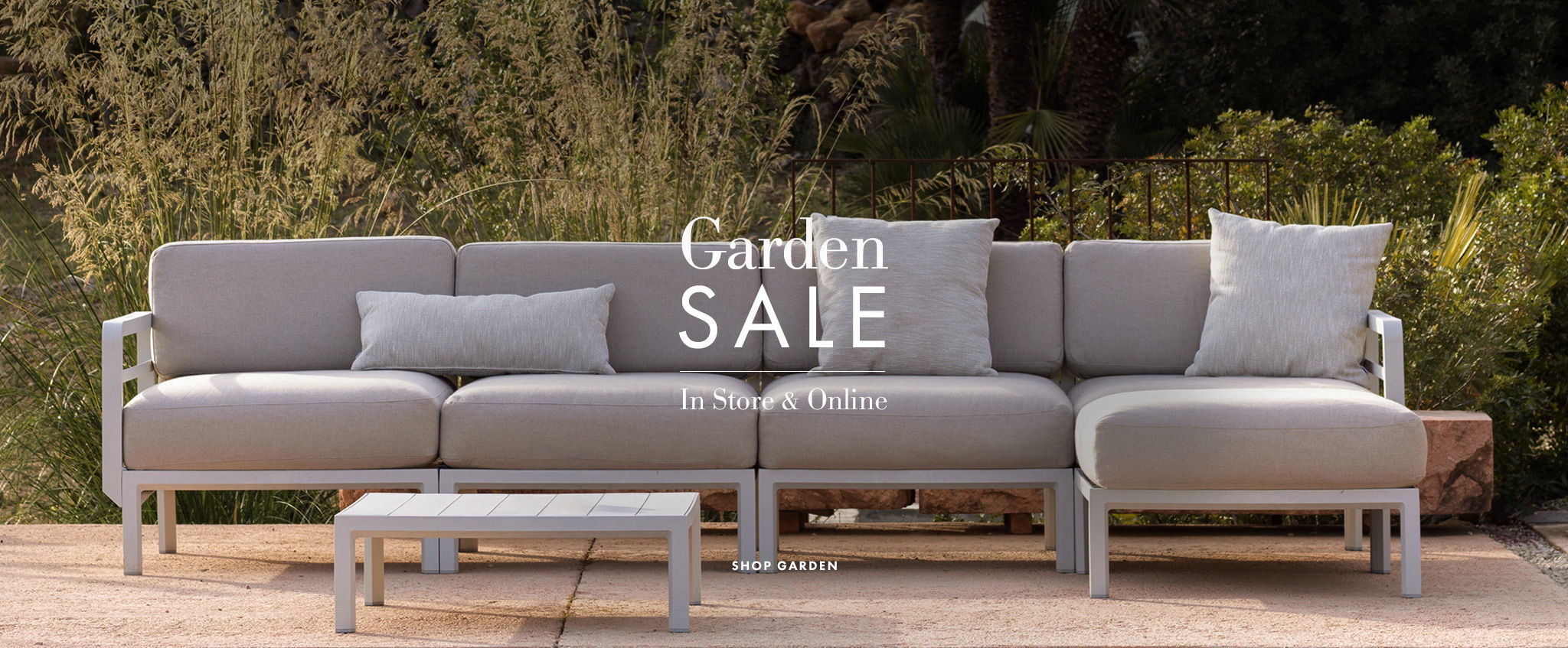 Maximo outdoor sofa banner - Garden sale now on in Norwich