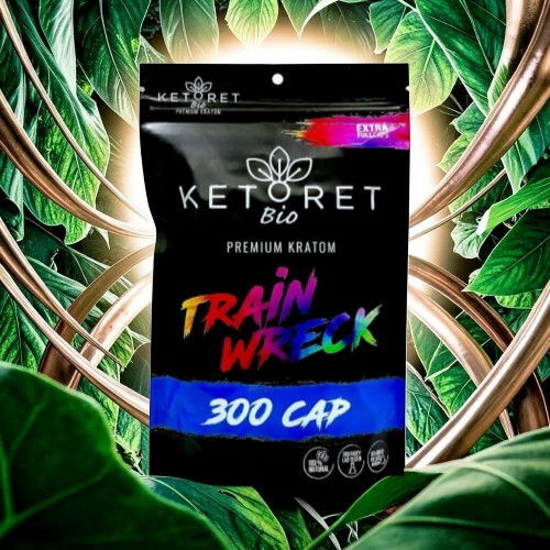 Black packaging of Ketoret Bio Train Wreck 300 capsules against green leaves.