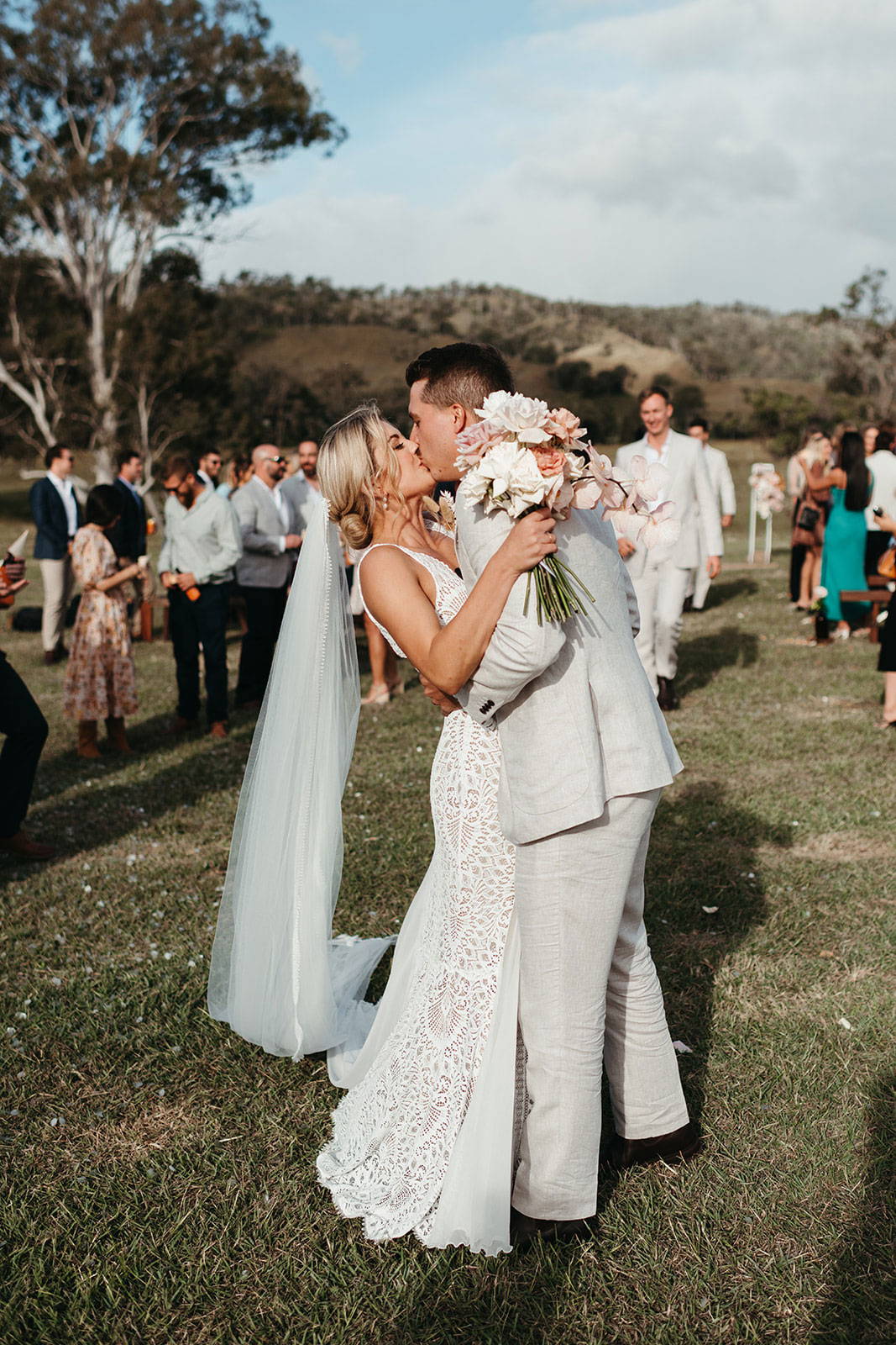 Bride and groom first kiss