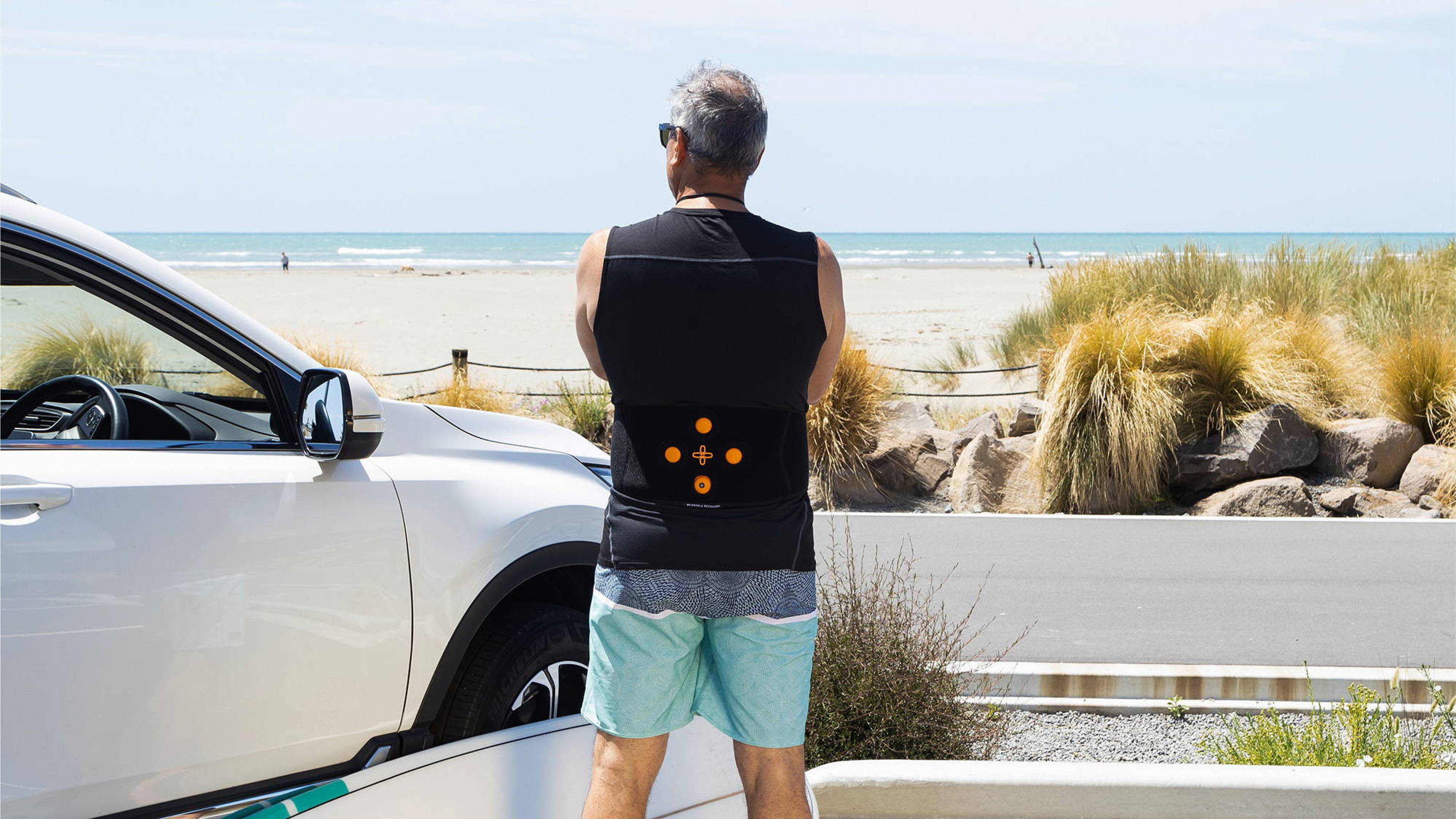 Lower back pain wearable physiotherapy for surfers.