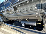 HornBlasters air tank installed in open RamBox compartment on black RAM truck