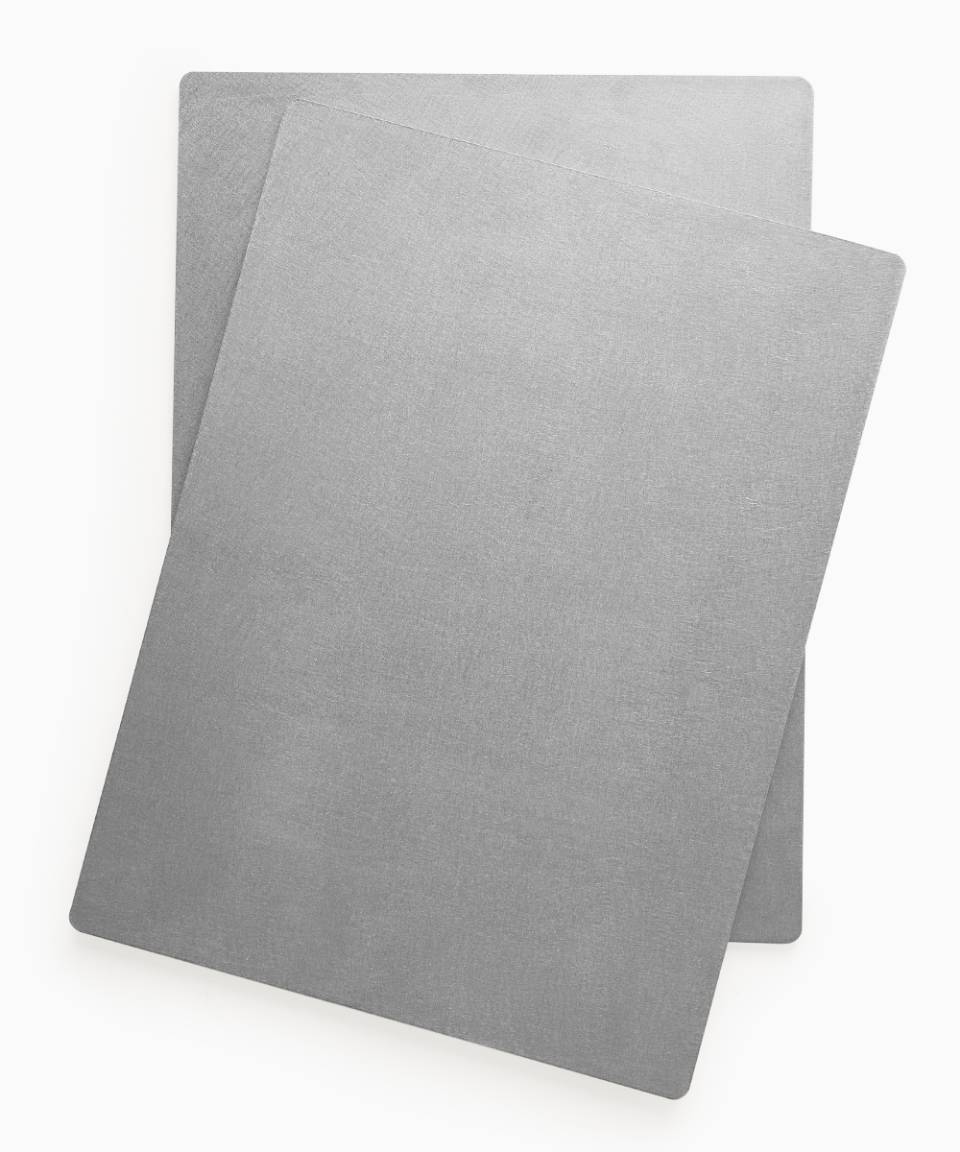 Two grey Misen Oven Steels stacked on top of each other, seen from directly overhead.