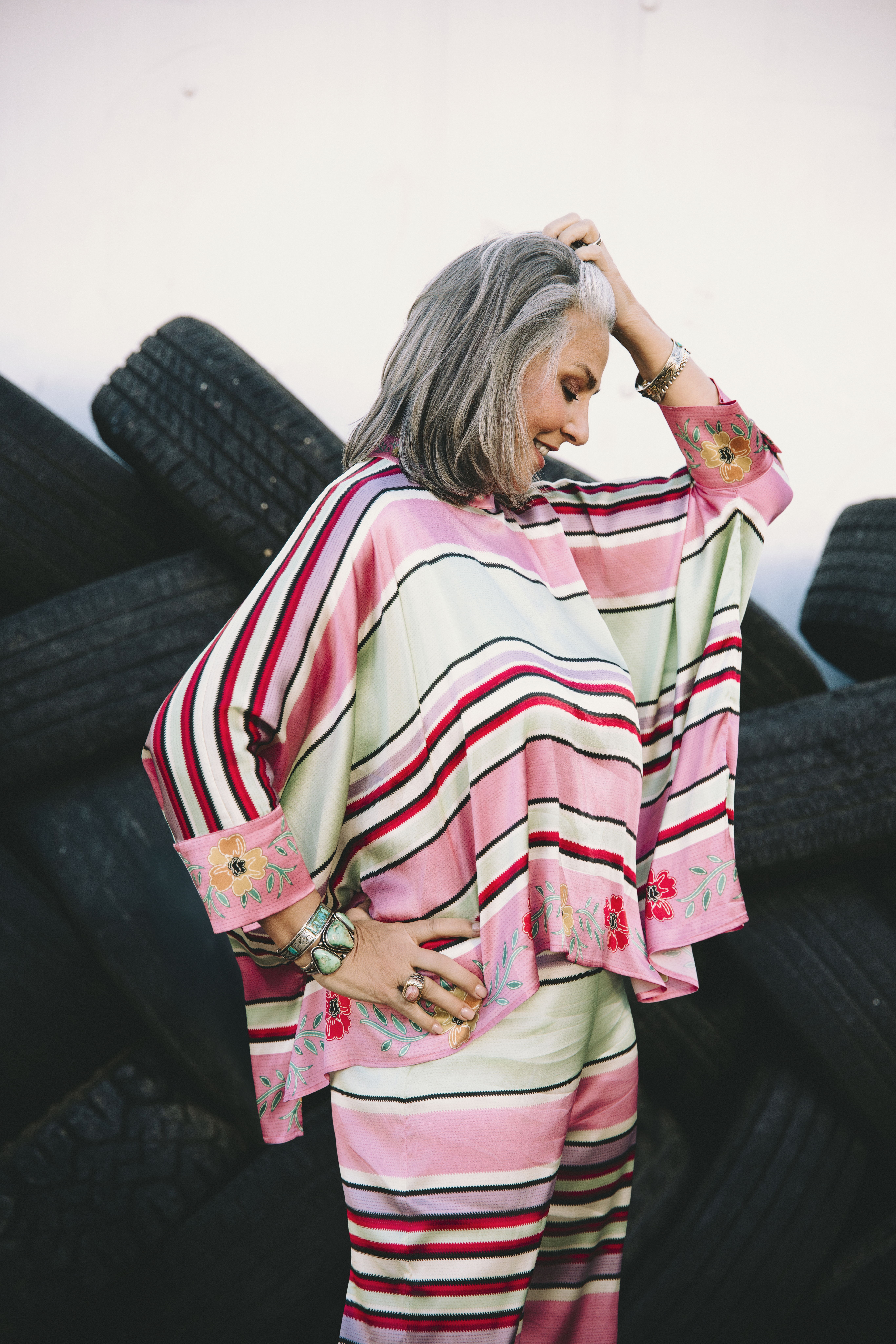 Audrey wearing the Round Top Serape Poncho and Pant with Double D Ranch jewelry