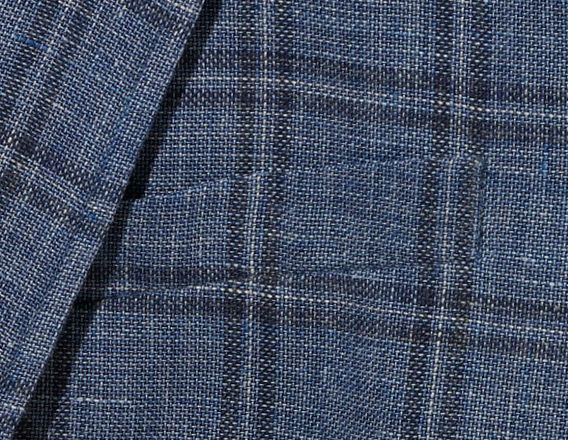 Close-up of blue plaid fabric texture.